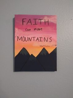 a painting on the wall that says faith can move mountains