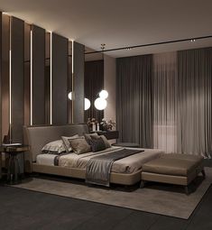 a modern bedroom with black walls and white carpeting, along with a large bed