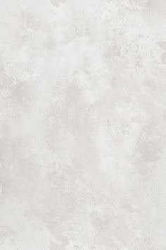 a white marble textured background with small speckles