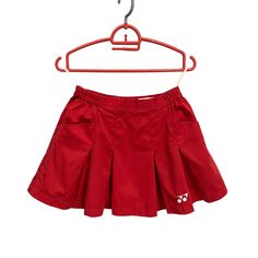 "Vintage 90s Yonex Pleated Mini Skirt Skater Training Badminton Tennis Sports Cheerleader Skirt Yonex Embroidered Logo Red Size 24-25 * Used. In good condition (8/10) minor signs of wear only (view photos) * 65% polyester + 35% cotton. Made in Japan * Tagged size 64cm. Best for XS or S. 64 cm waist / 24-25\" (circumference) 90-92 cm hips / 35-36\" (circumference) * Length measurement approx : 13.25\" BUY 3 ITEMS GET FREE SHIPPING WORLDWIDE ATTENTION : PLEASE READ * SHIPPING via PREMIUM EXPRESS. Delivery about 5 business days to major cities / towns. * SOME REMOTE AREA delivery takes longer. Usually within two weeks after shipped out." Red Mini Tennis Skirt For School, Red Pleated Skirt For School In Spring, Red Skort For School In Spring, Casual Red Tennis Skirt For School, Sporty Red Tennis Skirt For Summer, Sporty Red Fitted Skirt, Red Lined Mini Tennis Skirt, Sporty Red Skirt For Spring, Red Cotton Skorted Skort