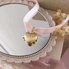 An handmade romantic pink velvet choker with a lovely heart locket pendant, made of 14k gold plated brass, the perfect accessory to treat yourself and romanticize your everyday look, for an enchanted coquette style! The locket measures 28x25 mm including the bail, it opens up and it is suitable as perfume diffuser because on the back side it is perforated with small hearts. The bail is filled with cubic zirconia rhinestones. - Choker length: customizable + 5 cm extender chain - Materials: Velvet Pink Feminine Choker Jewelry, Pink Heart Shaped Locket Jewelry, Pink Heart-shaped Choker Gift, Pink Heart-shaped Choker As A Gift, Vintage Pink Heart Necklaces, Coquette Heart, Aesthetic Perfume, Coquette Jewelry, Perfume Diffuser