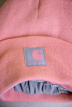 Fall is on the horizon so be sure you are fall ready with one of our Carhartt Knit Satin Lined Beanies for Women in Aged Coral. Featuring a classic Carhartt front logo patch and cuff that can be adjusted for the perfect fit and its better for your hair with its satin lining. Features:Carhartt Style:  106425-P43Color: BrownWomen's beanies100% polyester ribSatin liningPolylana® is a lower-impact fiber that requires less energy and water usage during production, compared to traditional acrylicCarhartt label sewn-on front Beanies For Women, Carhartt Style, Animal Shoes, Youth Shoes, Water Usage, Sneaker Slippers, Women's Beanie, Judy Blue Jeans, Jumpsuit Shorts Rompers