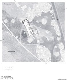 an aerial view of the house and its surrounding area, with plans for the building