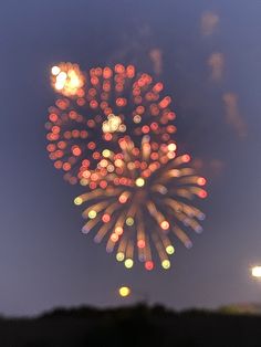 fireworks are lit up in the night sky