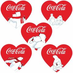 four heart shaped stickers with polar bears and coca - cola logos on them in the shape of hearts