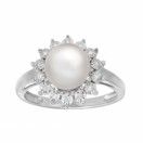 a white pearl and diamond ring