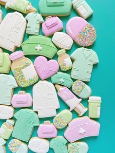 some cookies that are shaped like doctors and nurse's uniforms