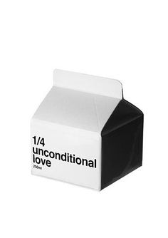 a black and white photo of a milk carton with the words unconventional love written on it