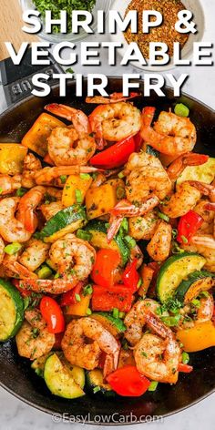 shrimp and vegetable stir fry in a skillet with the title overlay reads shrimp and vegetable stir fry