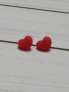 Red heart stud earrings are 1/2 inch wide. Posts are hypoallergenic and nickel free. Also available in clip on. Cloth Store, Heart Stud Earrings, Puffy Heart, Earrings Red, Heart Studs, Heart Earrings Studs, Jewelry Cleaner, Valentine Heart, Jewelry Earrings Studs