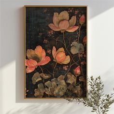 a painting hanging on the wall next to a potted plant with leaves and flowers