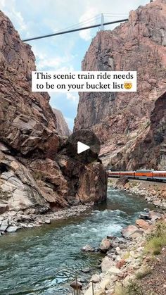 a train traveling through a canyon next to a rocky mountain side with a river running between it