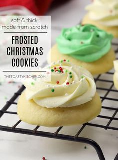 frosted christmas cookies on a cooling rack