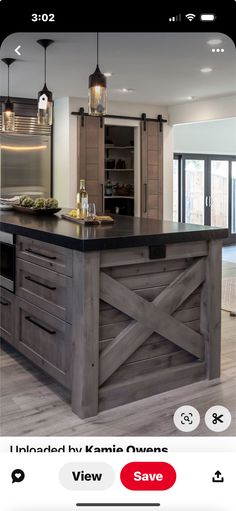 a kitchen island made out of wooden planks