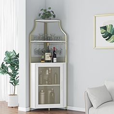 a living room with a white couch and a wine rack