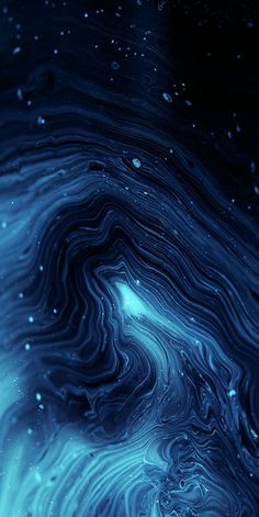 an abstract blue and black background with water droplets on it's surface, as well as bubbles