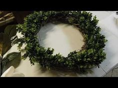 a wreath is sitting on top of a table