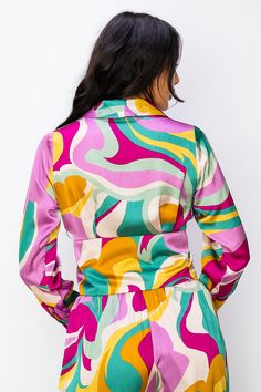 • SKU: T-5169• S-M-L• Hand wash only• Elevate your style with our Vibrant Multi-Color Long Sleeve V-Neck Blouse featuring a chic collar and button closure. • This eye-catching blouse showcases a dynamic blend of colors, adding a playful and stylish touch to your outfit. With its comfortable long sleeves and versatile design, it's the perfect choice for both casual and semi-formal occasions. Green V-neck Top With Vibrant Print, Green V-neck Top For Brunch, Vibrant V-neck Multicolor Print Blouse, Vibrant Multicolor Print V-neck Blouse, Vibrant V-neck Blouse In Multicolor Print, Vibrant V-neck Blouse With Multicolor Print, Vibrant V-neck Blouse With Vibrant Print, Green Top With Vibrant Print For Fall, Trendy Green Blouse With Vibrant Print