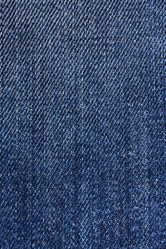 blue jeans textured with small white dots