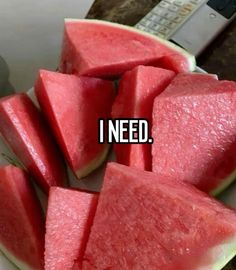 watermelon slices on a plate with the words i need