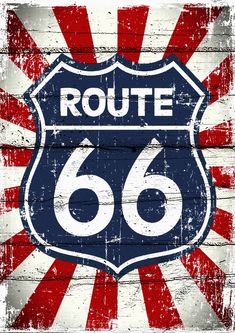 an old sign with the word route 66 painted on it in red, white and blue