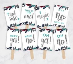 four popsicles with the words hey yes on them