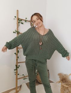 ✤ It's a crocheted jumper with a V-neck and back, woven in premium acrylic wool super soft and hypoallergenic. The jumper is in a green color, a perfect color for any season. ✤ It's knitted with a stitch that makes the garment even softer and fluffier, light, and with a beautiful drape. Additionally, its V-neck and back allow you to let it fall off one shoulder, making it more stylish and giving it a more relaxed look. ✤ I've also added cuffs so that when you let the sleeve fall over the shoulde Crochet Jumper Pre Made, Slouchy Crochet Sweater Pattern, Pokemon Crochet, Crochet Green, Crochet Jumper, V Neck Jumper, Lord Help, Lord Help Me, Womens Pullover Sweaters