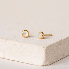 Dainty moonstone stud earrings with stunning blue and white tones, perfect for daily wear.

Moonstone is the stone of hope and purity and is believed to encourage personal growth and emotional healing.

Moonstones measure at 4mm. Moonstone Earrings Gold, Gold Vermeil Jewelry, Vermeil Jewelry, Moonstone Jewelry, Sustainable Jewelry, Traditional Jewelry, Recycled Sterling Silver, Emotional Healing, Moon Stone