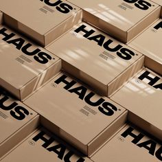 several boxes stacked on top of each other with the words haus printed on them