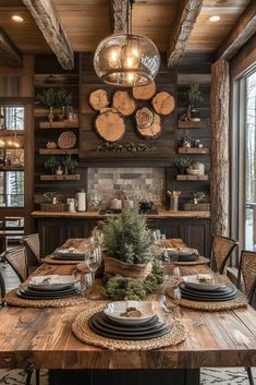 a dining room table with plates and place settings