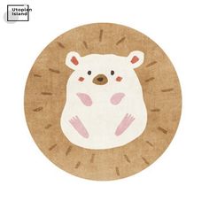 a round rug with a polar bear on it's face in brown and pink