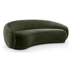 the curved sofa is made from dark green velvet, and has a rounded backrest