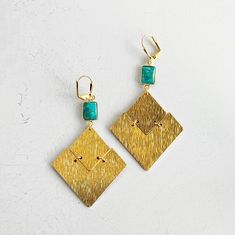 So fun and trendy, these earrings will make your outfit! GEMSTONE: Turquoise MATERIAL: Gold plated brass CLOSURE: Gold plated leverback LENGTH: 3" long Turquoise Statement Earrings, Craps, Gold Statement Earrings, Diamond Pendants, Gems Jewelry, Chandelier Earrings, Diamond Pendant, Stitch Fix, Statement Earrings