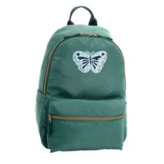 a green backpack with a white butterfly on the front and blue wings on the back