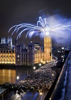 fireworks light up the night sky above big ben