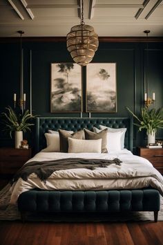 a large bed sitting in a bedroom next to two planters and a painting on the wall