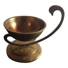 GORGEOUS Vintage Solid Brass 5" Oil Lamp or Incense Burner. Made in India.  This vintage solid brass oil lamp or incense burner is a stunning addition to any collection. With its intricate detailing and durable brass material, it is sure to impress. Its versatile size of 5 inches makes it perfect for any room in the house. The warm glow it emits creates a cozy and inviting atmosphere.  The brass material ensures longevity and durability, making it a perfect addition to any collection. Its intric Brass Candle Holders, Brass Candle, Oil Lamp, Candle Accessories, Incense Burner, Oil Lamps, Brass Material, Incense, Solid Brass