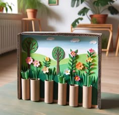 a cardboard box with flowers and trees on it