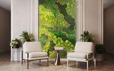 a living room with two chairs and a large painting on the wall behind them that is covered in green plants