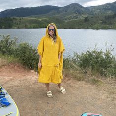 Transform your beach, lake or river experience with our Shoreline Hooded Changing Poncho! Ditch the extra towel and slip into our versatile poncho that doubles as a towel, a changing robe and cover up. It'll keep you cozy and dry while you switch up your swimwear. Say goodbye to awkward towel slipping! Cause who needs that? Made with soft terrycloth material, our poncho is unisex sized and tested on multiple body types. It comes complete with an oversized hood with adjustable drawstring and a ka Flannel Jacket Women's, Colorado Hat, Colorado Shirt, Keychain Hook, Long Tee Shirts, Changing Robe, Kids Beanies, Hooded Poncho, New Fathers