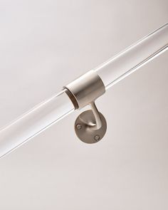 an overhead view of a light fixture on a white wall with no lighting in it