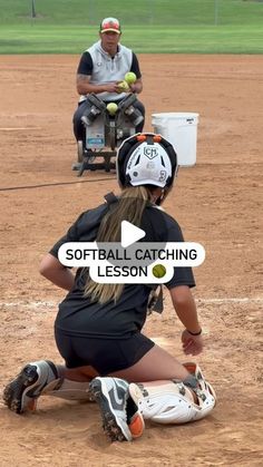 a softball player kneeling on the ground with a ball in her hand and an umpire behind her