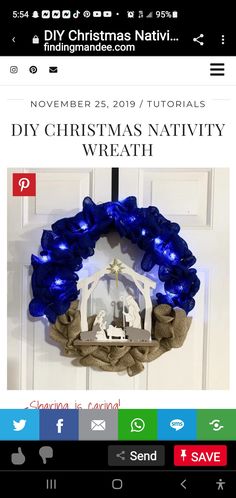 a christmas wreath with blue lights hanging from the front door and an ad for diy christmas nativity