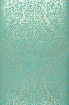 a blue and gold wallpaper with an intricate design on it's side,