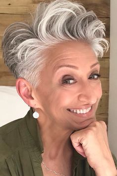 This fun and puffy pixie cut shows off a textured and multi-layered style, perfect for giving a younger feeling. The silver-gray color brings a trendy touch, embracing the natural nice look of older hair with a new way. The narrower sides and back along with the longer, piece-y strands on top make a flexible look that is both - Click to see more of Revamp Your Look: 40 Chic Haircut Ideas for Women Over 60 and follow us for more hairstyle ideas. // Photo Credit: Instagram @age_inappropriate Light Wispy Bangs, Layered Pixie Cut, Pixie Haircuts For Women, Chic Haircut, Curly Pixie Haircuts, Pixie Cut With Bangs, Asymmetrical Pixie, Soft Blonde