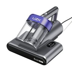 a close up of a vacuum on a white background with the words uzk above it