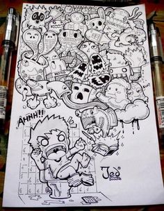 a bunch of cartoon characters drawn on top of a piece of paper with marker pens