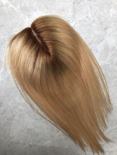 Human Virgin Hair Topper; Dark Root Blonde European Human Hair Silk Base Hair Topper DETAILS ABOUT THE TOPPER Size: 7x11cm  full silk base, soft base, free part Color:  brown rooted blonde hair color as pictures show Length: 14 inch  Density: 130% Human Hair: Premium quality virgin hair, 100% real human hair. Usage: For hair volume/ thinning hair SHIPPING & DELIVERY&RETURN Order processed within 1-2 business days, then shipped via FedEx Express. Usually it takes about 3-4 days to deliver the package. The package is shipped from China. Return Policy: Please contact me when you need a return. I will send you a FedEx return label for the return, it will cost $50 usd. The shipment is international, so $50 usd for a label is necessary. Hope your kind understanding. Refund will be issued in 1-2 Dark Root Blonde, Rooted Blonde Hair, Root Blonde, Rooted Blonde, Hair Volume, Hair Topper, Human Virgin Hair, Dark Roots, Thinning Hair