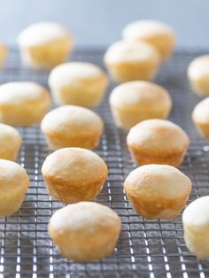 some muffins are cooling on a wire rack