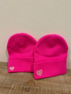 Bright pink beanie with heart patch detail that is customizable. Choose between small, medium and large pink or red hearts as well as how many hearts you'd like and their location on the beanie. Pink Beanie, Heart Patch, Pink Beanies, Heart Patches, Red Hearts, Skull Cap Beanie, Jan 20, Skull Cap, Red Heart